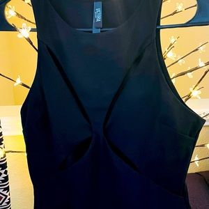 Victoria Secret bodysuit black with front cutouts.
